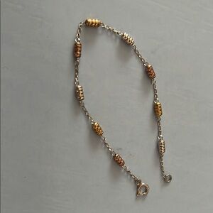 Elegant Gold and Silver Beaded Bracelet